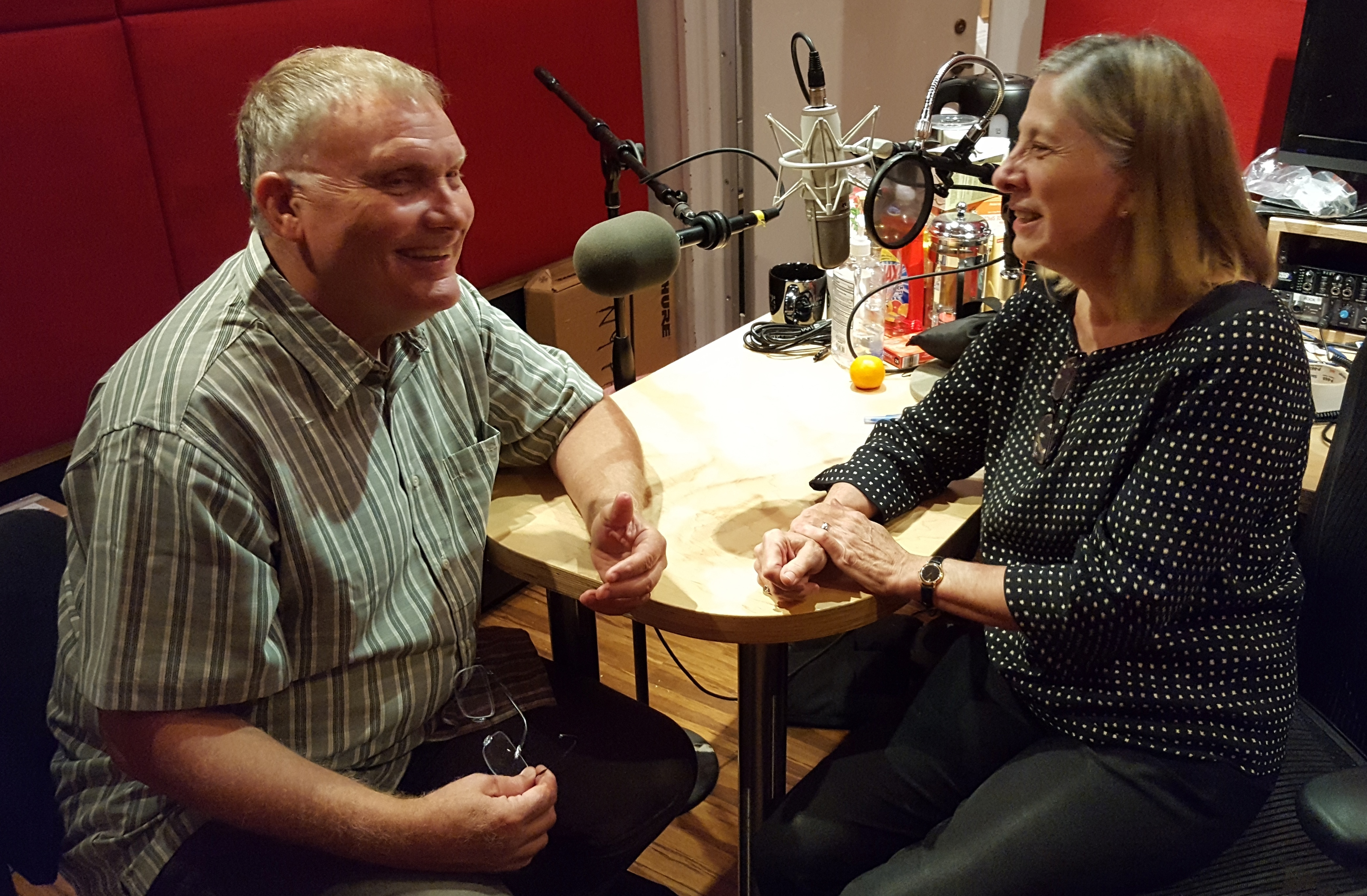 Philip Smith and Barbara Haws discussing music during orchestra archives research