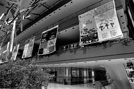 Banners honoring those affected by AIDS hang in Philharmonic concert hall in 1992 tribute.